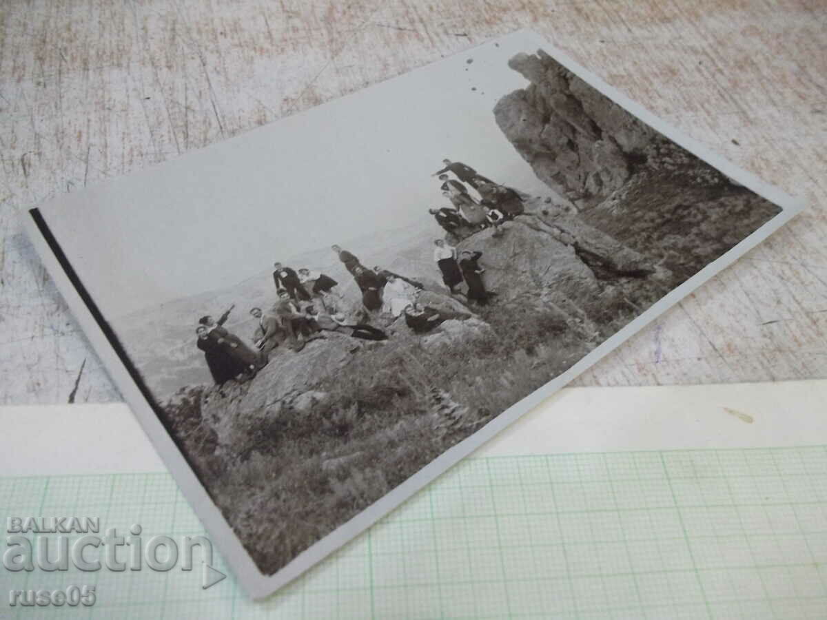 Auction Old photo of a group of youths on the rocks Auction Old photo of a group of youths on the rocks