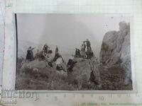 Old photo of a group of youths on the rocks