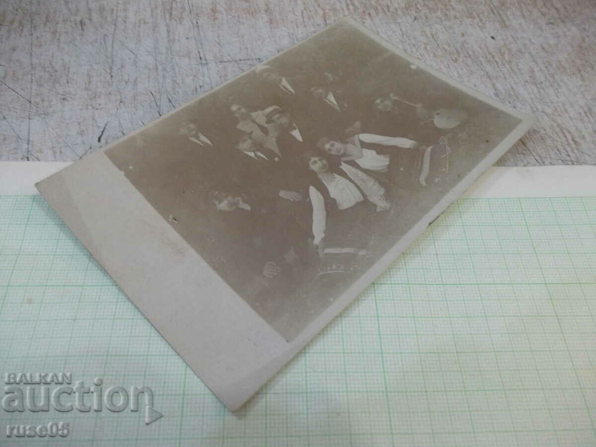 Auction  Old photo of a group of young men with two women in costumes