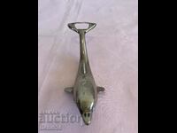 Old metal bottle opener "Dolphin"