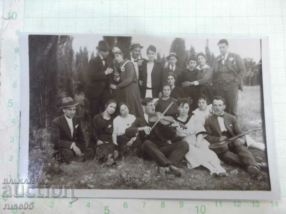 Old photo of an outing with musicians