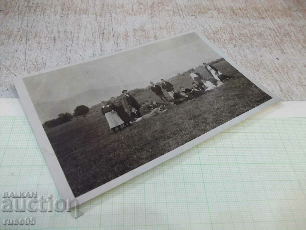 Auction Old photo of a group of youths in a field Auction Old photo of a group of youths in a field