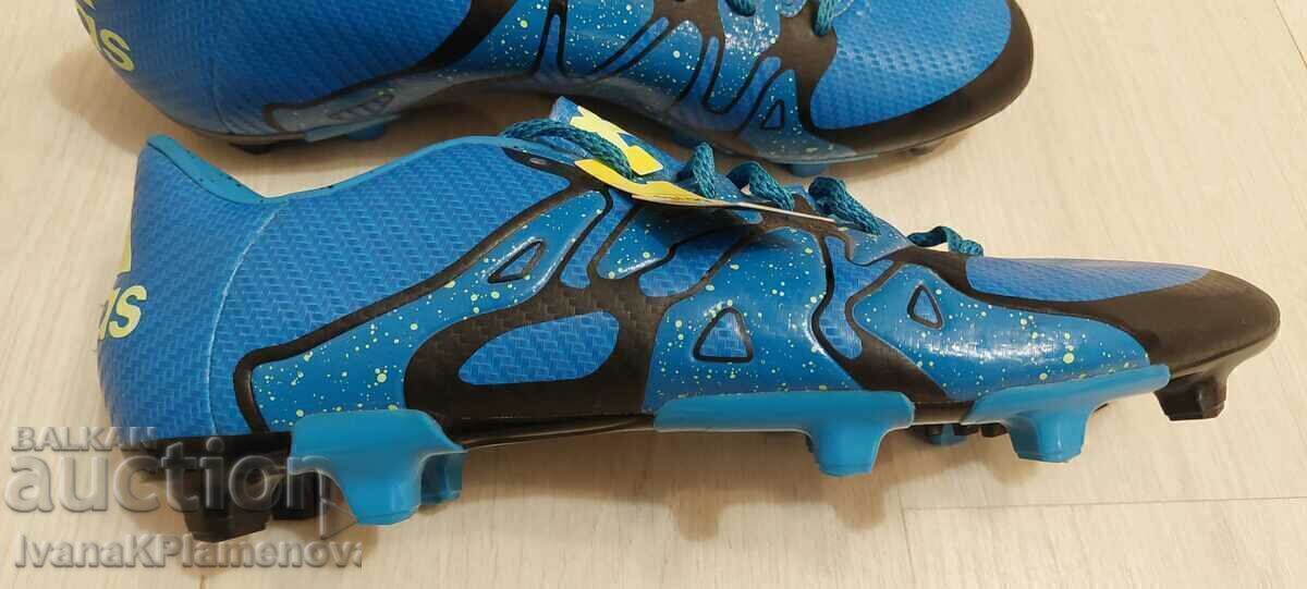 Auction Adidas sports shoes with studs, new Auction Adidas sports shoes with studs, new