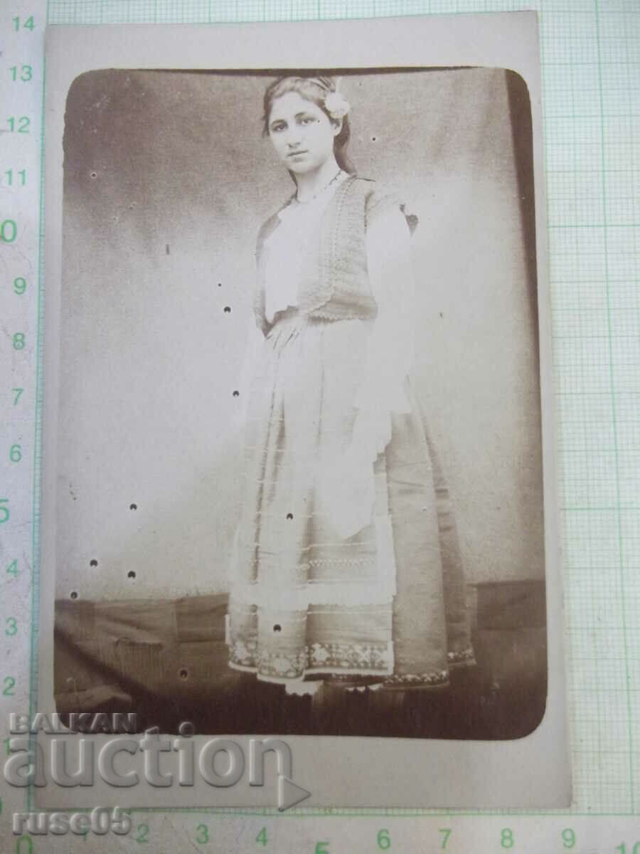 Old photo of a girl in costume