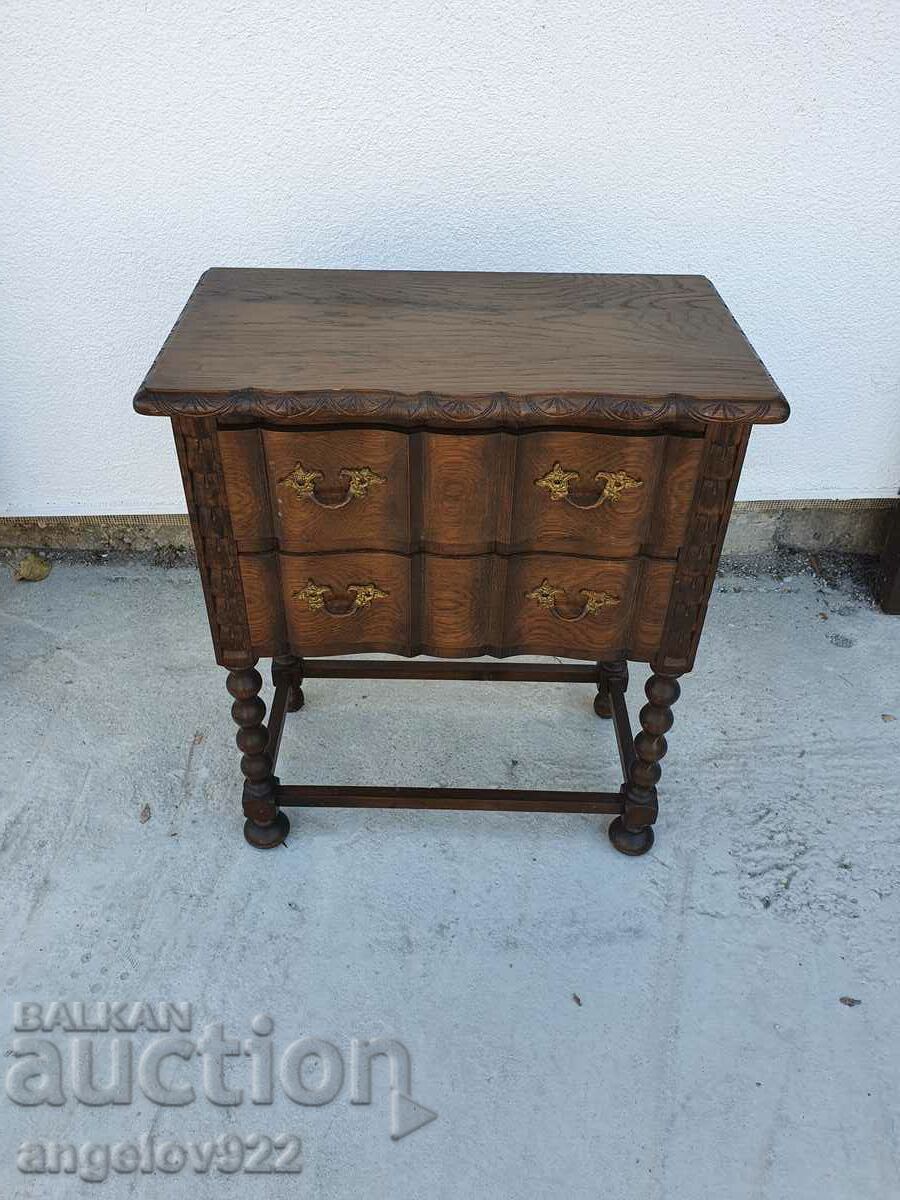 A small wooden chest of drawers!