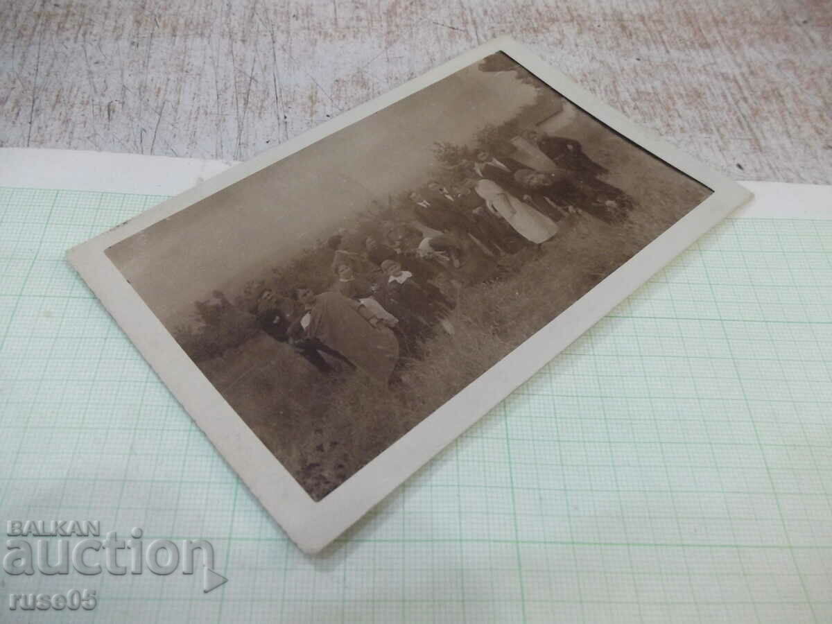 Delivery of Old photo of a group on the outskirts of town Delivery of Old photo of a group on the outskirts of town