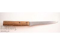 Antique knife with a wooden handle