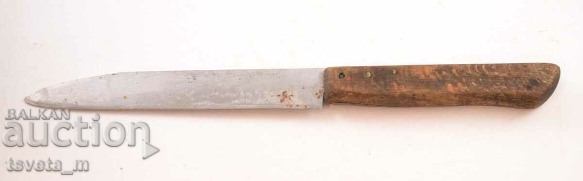 Antique knife with a wooden handle