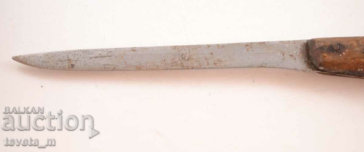 Delivery of Antique knife with a wooden handle Delivery of Antique knife with a wooden handle