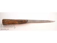 Antique knife with a wooden handle