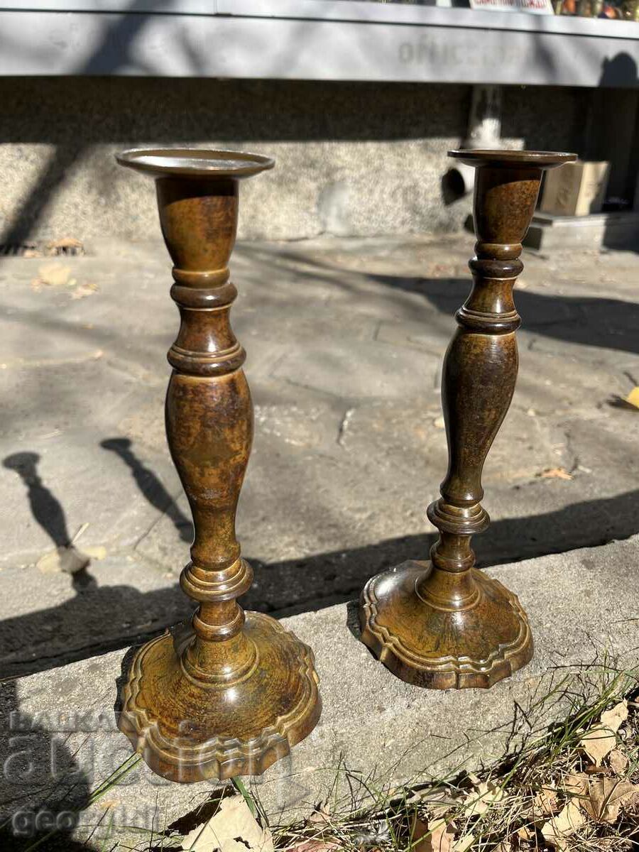 A pair of old bronze candlesticks. #6084