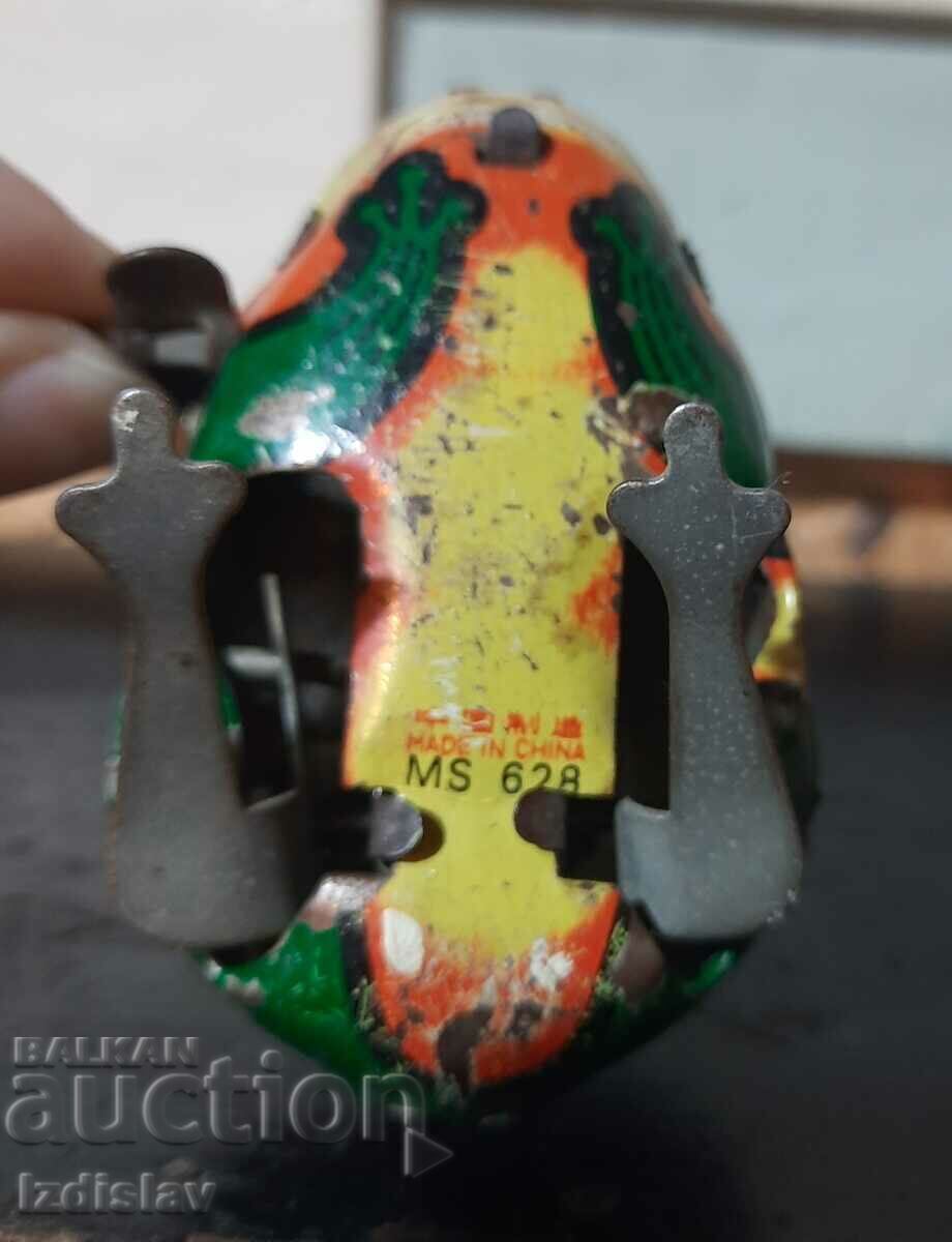 Auction  Tinplate mechanical toy frog