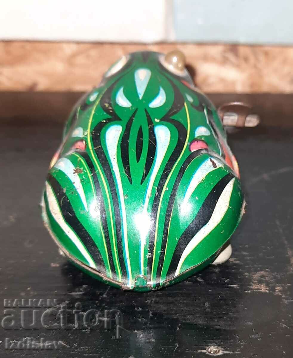 Delivery of Tinplate mechanical toy frog