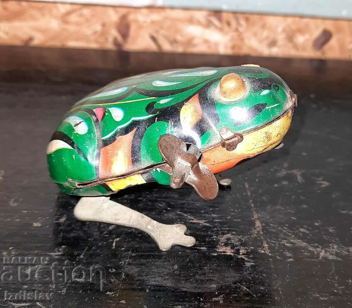 Tinplate mechanical toy frog