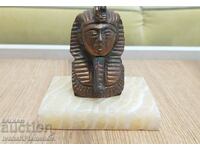 Metal figurine on marble for collectors