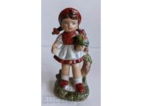 .PORCELAIN FIGURE THE RED RIDING RIDING STATUETTE MARKED