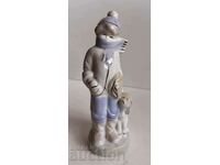 .BOY WITH DOG PERFECT BEAUTIFUL PORCELAIN FIGURE STATUETTE