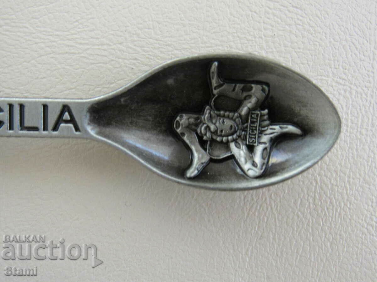 Auction  Metal magnet-opener from Sicily, Italy-1