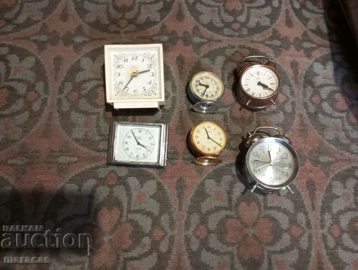 Lot of old alarm clocks