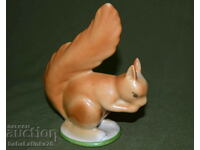 A beautiful porcelain figurine of a squirrel