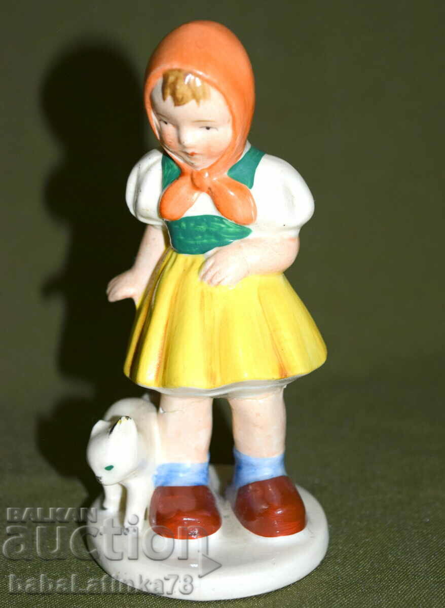 A beautiful porcelain figurine of a girl