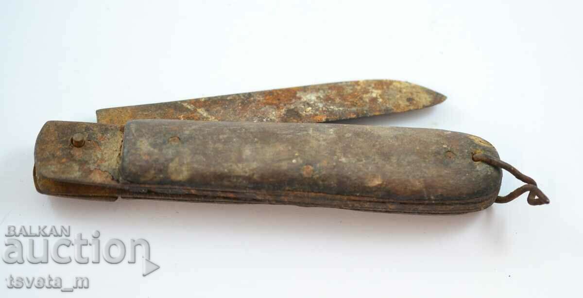 Antique pocket knife with wooden handle