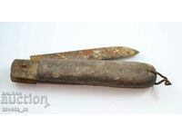 Antique pocket knife with wooden handle