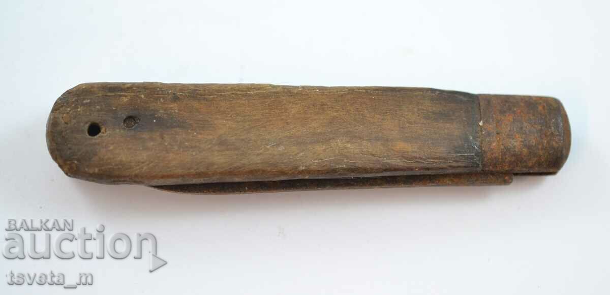 Antique pocket knife with wooden handle