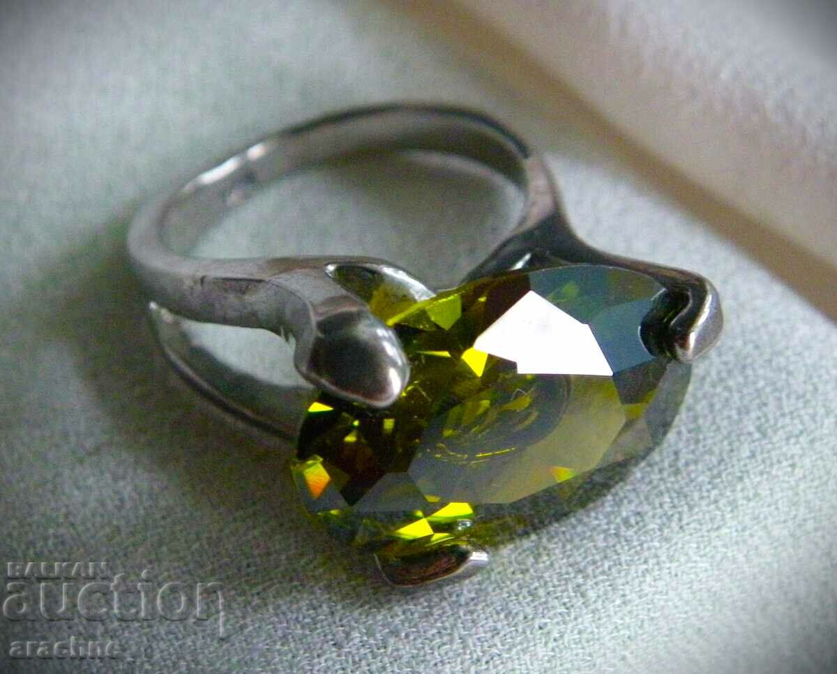 Auction Silver ring with a large tourmaline Auction Silver ring with a large tourmaline