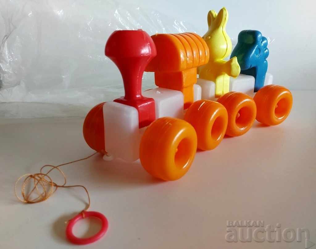 . SOC CHILDREN'S PLASTIC PULL TRAIN TOY