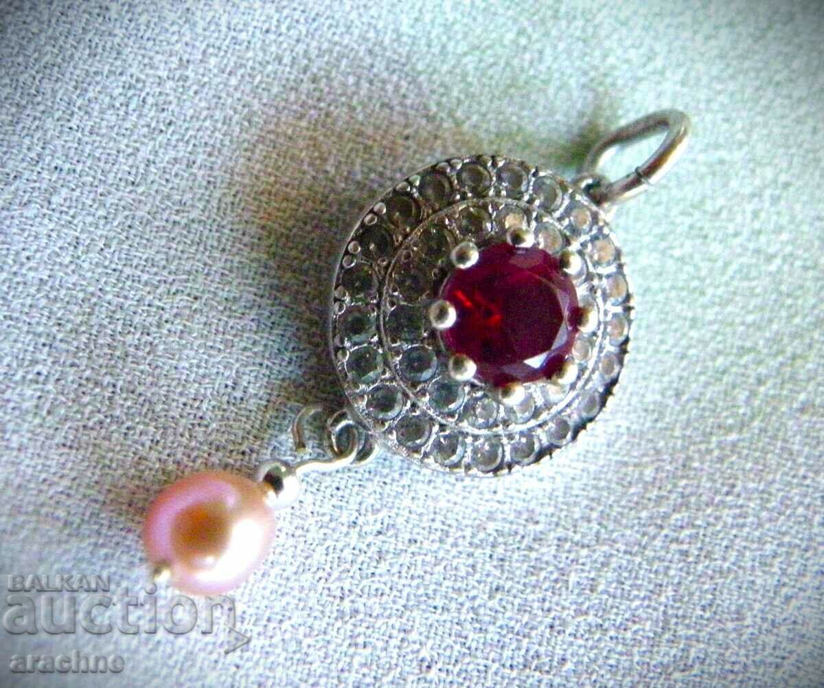 Auction  Silver locket with ruby and pink pearl