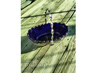 Chrome basket with cobalt blue glass bowl