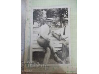 Old photo of two men on a bench