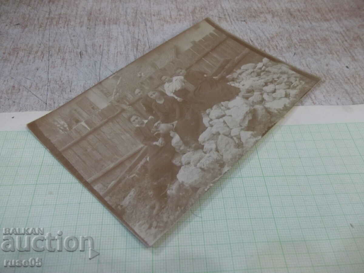 Auction  Old photo of five women with a pitcher in front of a fence