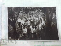 Old photo of young people in the garden - 1