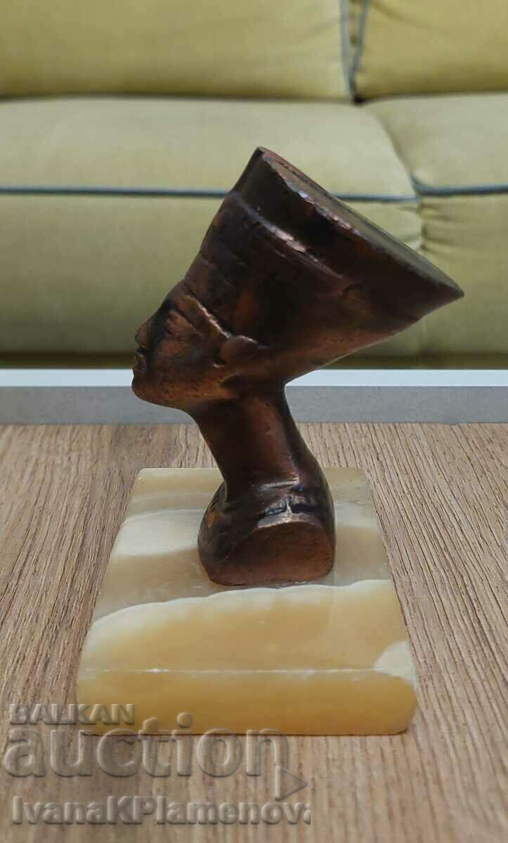 Auction Egyptian metal figurine on marble for collectors Auction Egyptian metal figurine on marble for collectors
