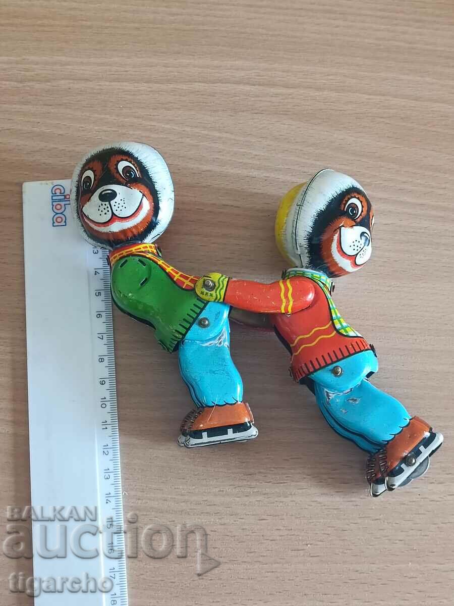 Livrarea O jucărie veche de tablă Livrarea O jucărie veche de tablă