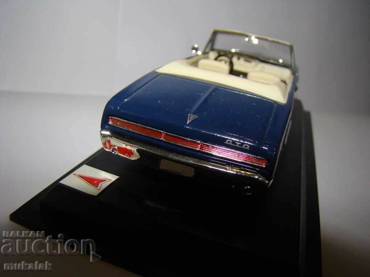 Delivery of 1:43 PONTIAC GTO 1964 TOY CAR MODEL Delivery of 1:43 PONTIAC GTO 1964 TOY CAR MODEL