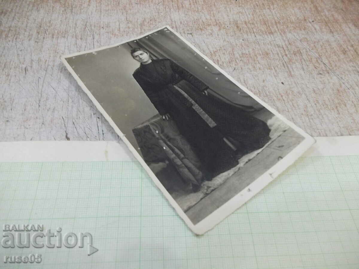 Auction Old photo of a woman at a table Auction Old photo of a woman at a table
