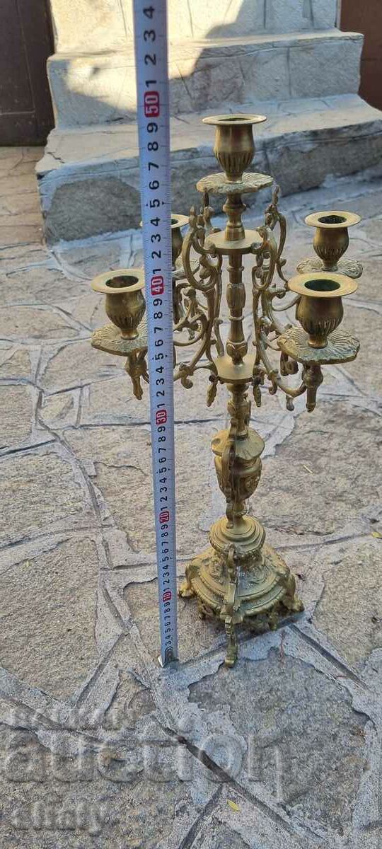 Delivery of Old bronze priest