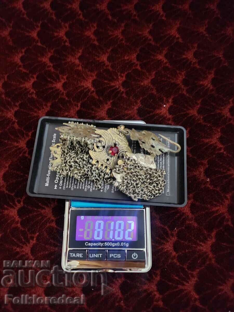 A 19th century silver men's pistol decoration collar with price 900.00 BGN | € 460.16 A 19th century silver men's pistol decoration collar with price 900.00 BGN | € 460.16