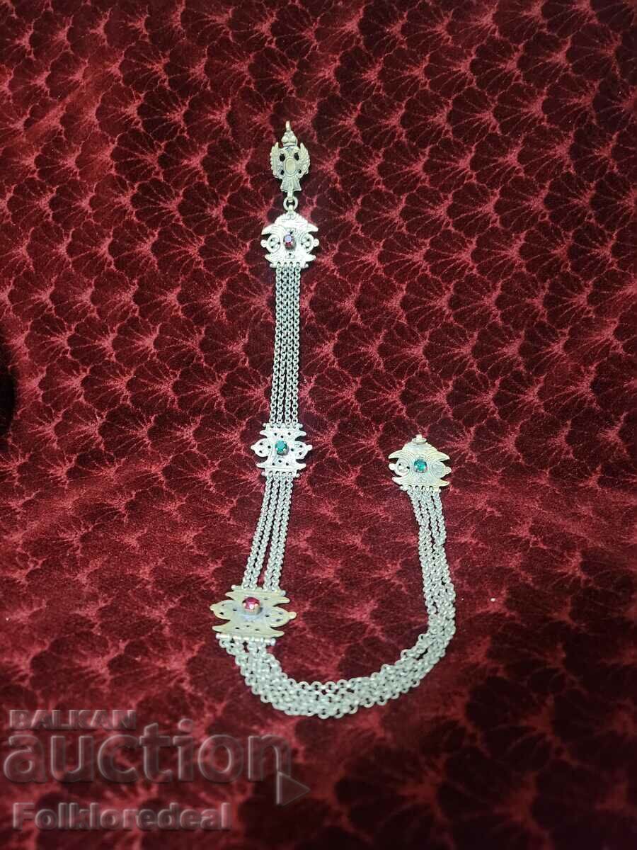 A 19th century silver men's pistol decoration collar A 19th century silver men's pistol decoration collar