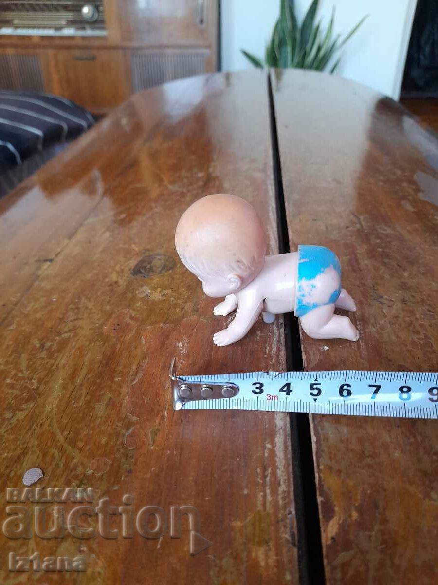 Delivery of Old mechanical baby doll Delivery of Old mechanical baby doll