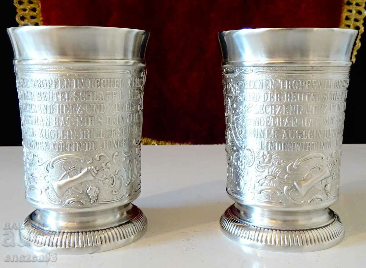 Auction  Tin wine glasses, scenes from a love song.