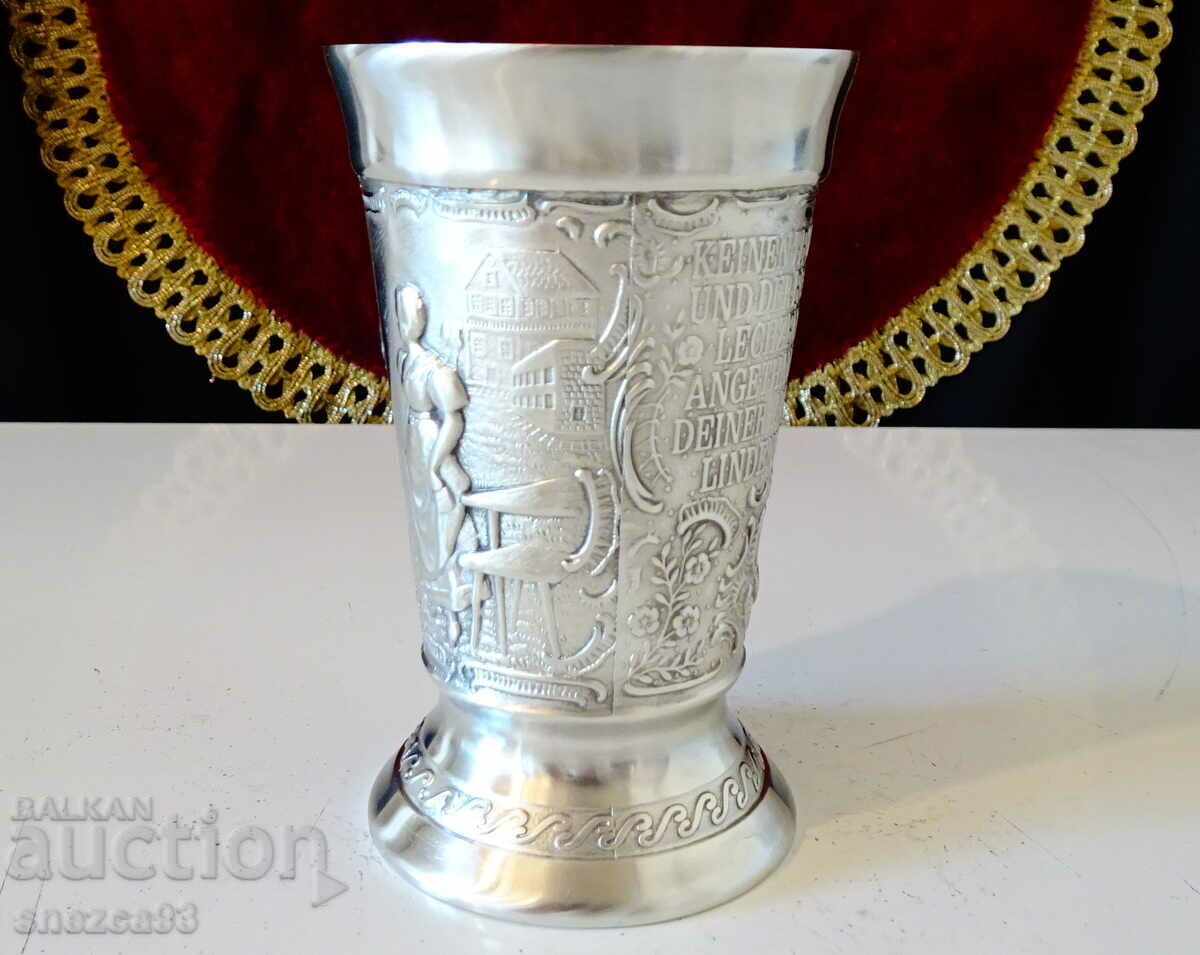 Auction German pewter cup, pictures of a love song. Auction German pewter cup, pictures of a love song.