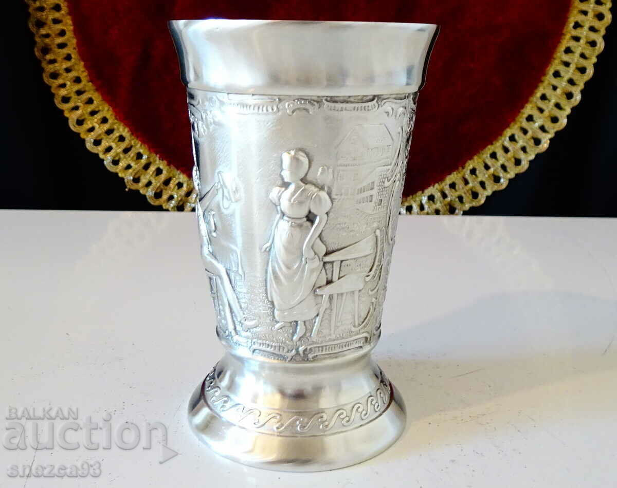 German pewter cup, pictures of a love song. German pewter cup, pictures of a love song.