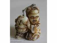 . FIGURA DE OS VECHI BUDDHA BONE SUPORT CHEIE