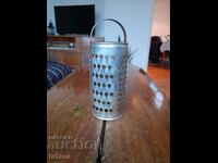 An old kitchen grater