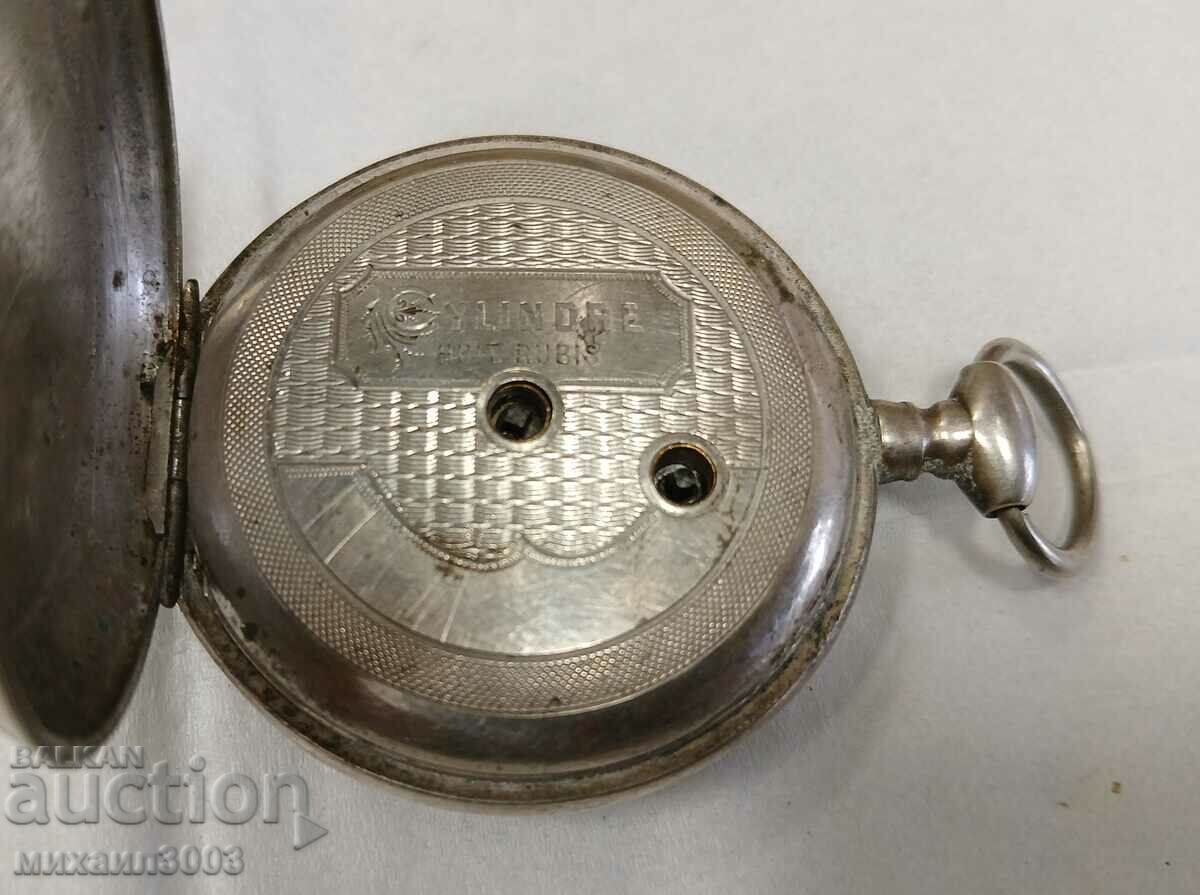 Delivery of ANTIQUE SILVER WATCH WITH KEY