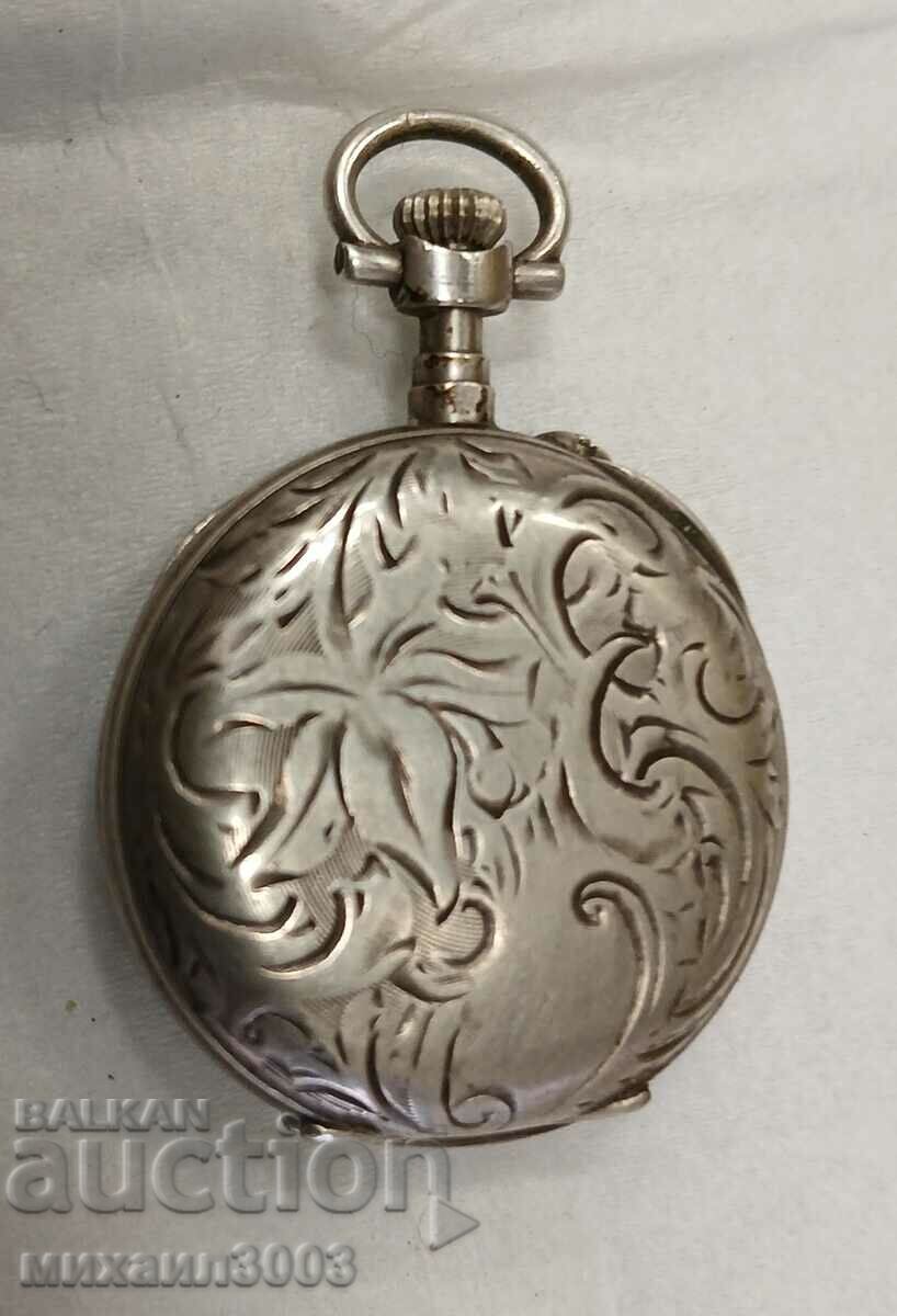 Auction  SMALL SILVER SWISS POCKET WATCH CIRCA 1940.